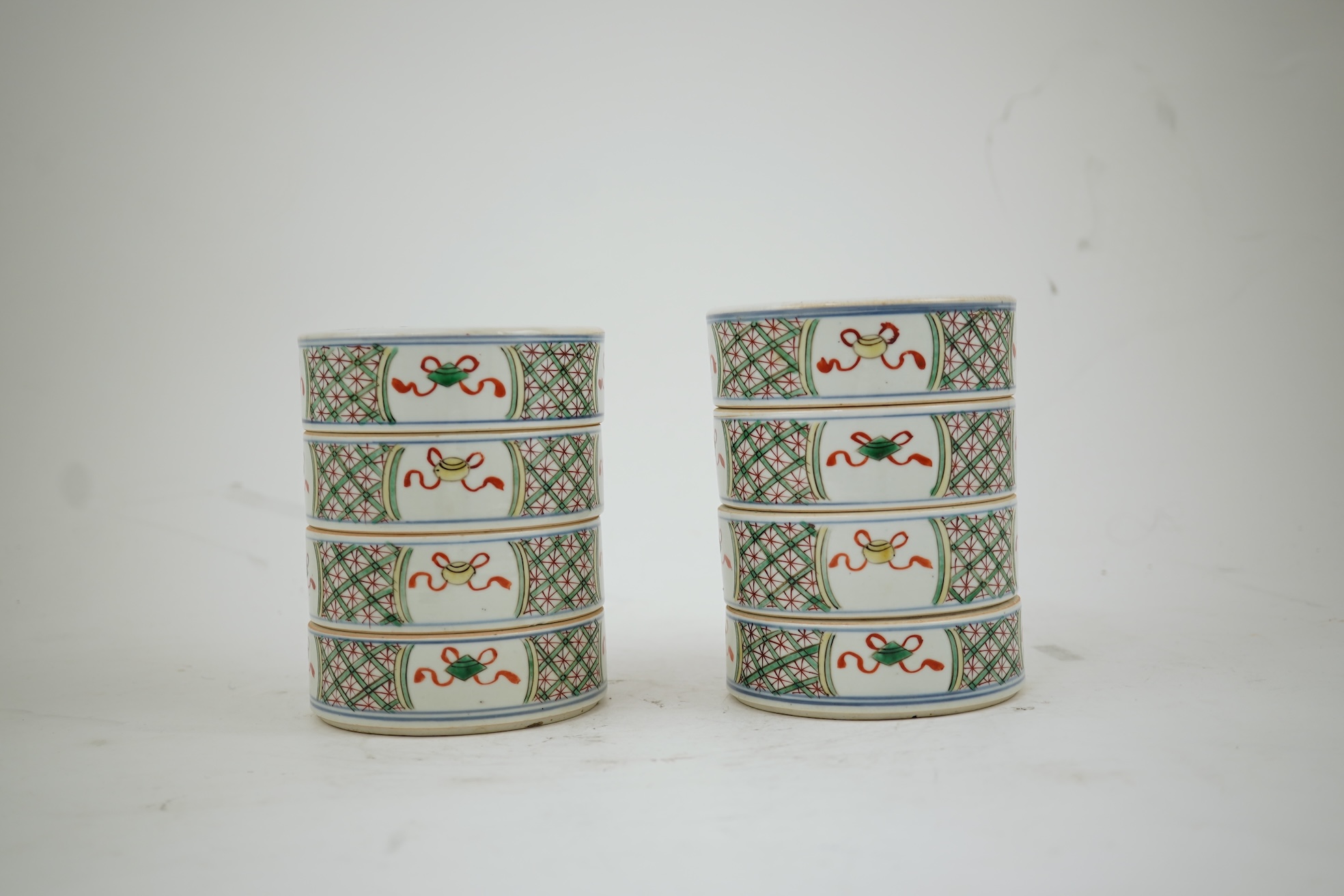 A pair of Chinese famille verte stacking containers, 18th/19th century